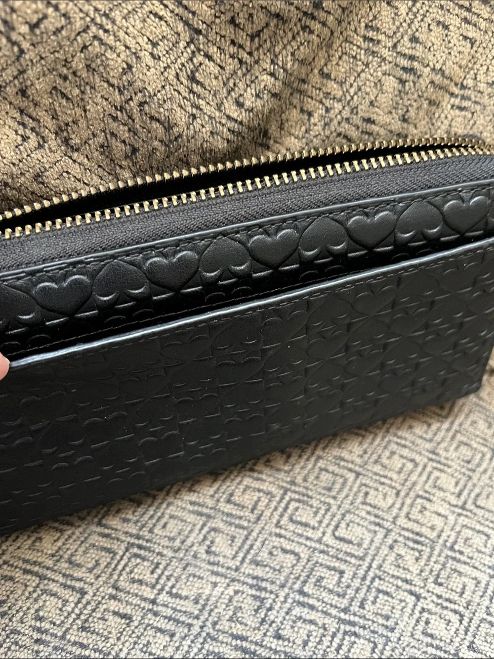 kate spade black quilted spade logo-embossed zip wallet with gold plaque